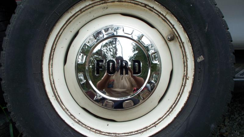 Stainless Steel 61/65 Hubcaps with Ford letters in Black